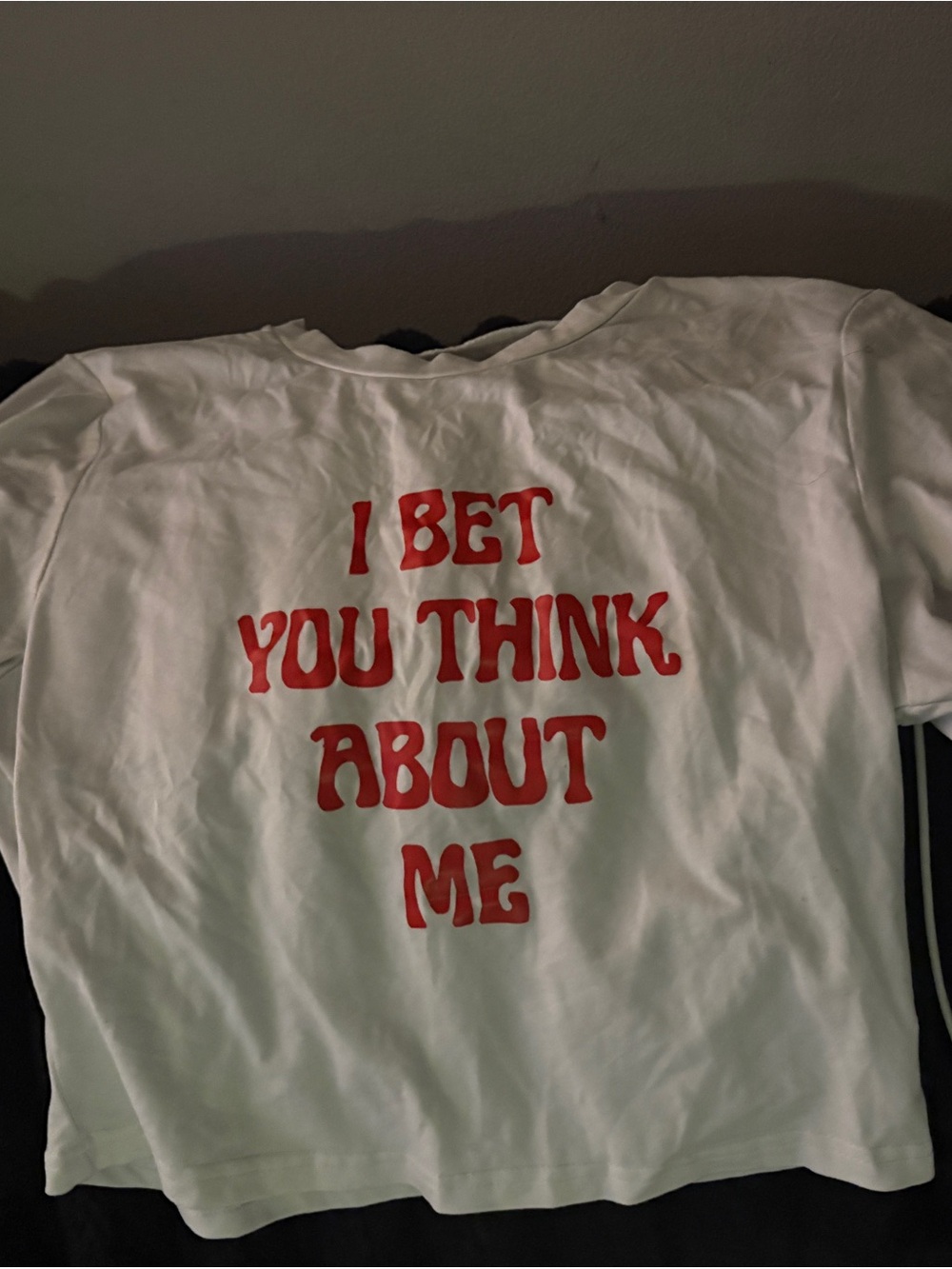 White Graphic Tee with Red Slogan "I Bet You Think About Me"